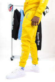 Trillest Yellow Multi Logo Sweatpants